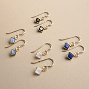 Meridian Earrings on gold