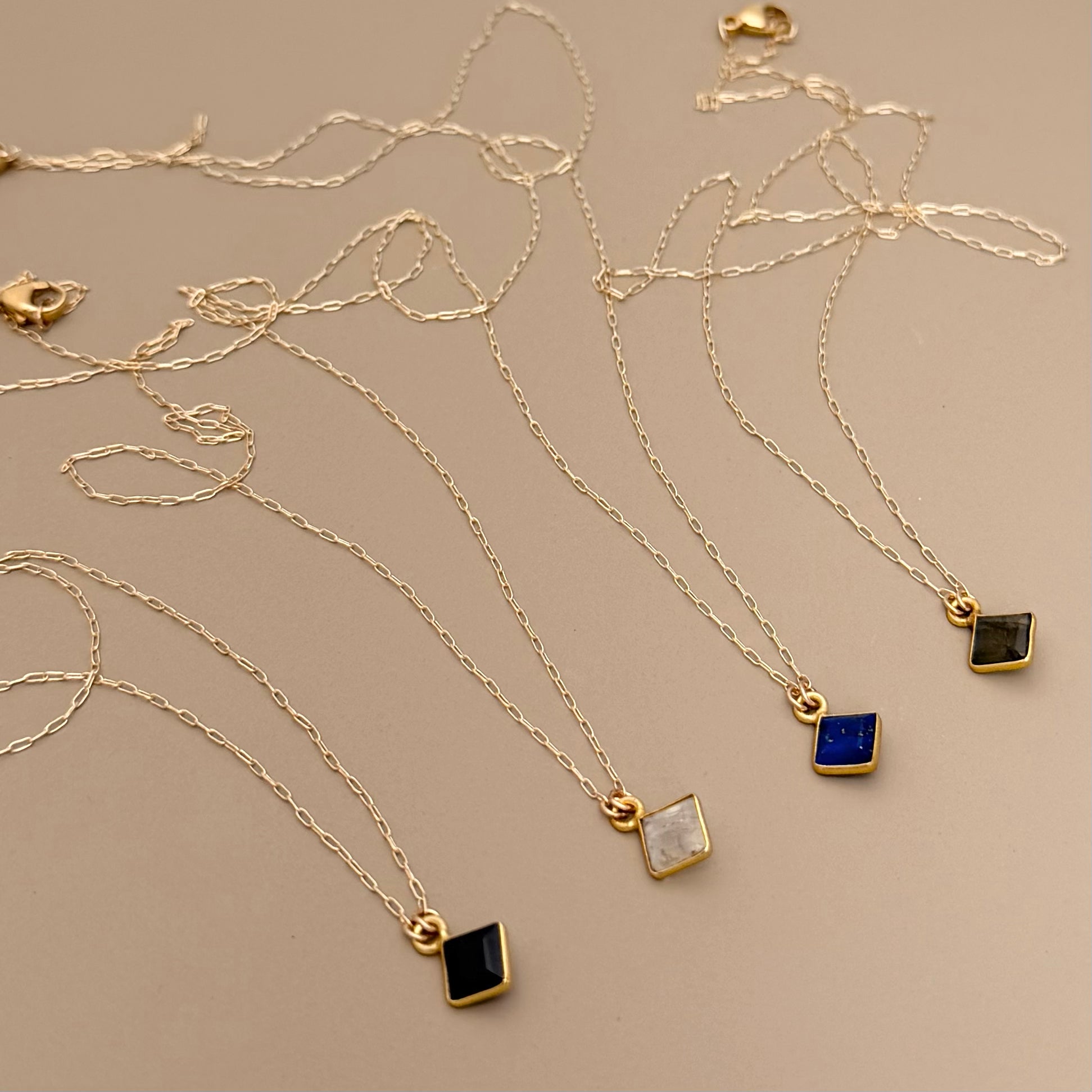 Meridian Necklaces on gold